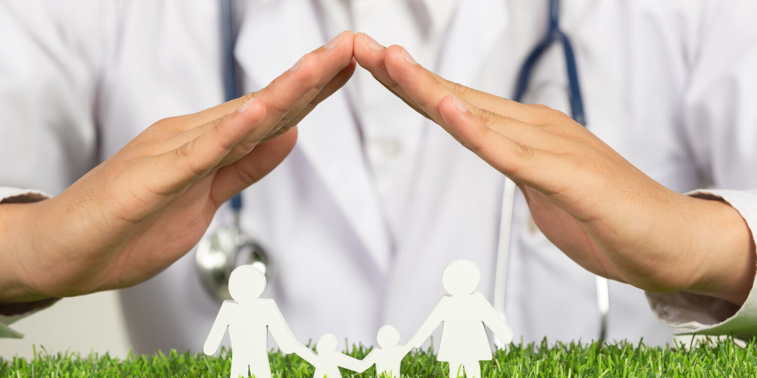 close-up-picture-doctor-s-hands-posting-symbol-home-family-member-model